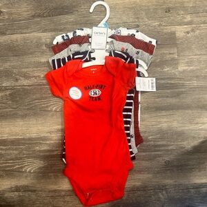 Carters 6 mo. 5 piece set shirt sleeve onesies. New with tags.